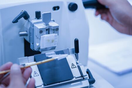 Rotary Microtome Section for diagnosis in pathology make microscope slide histology. Human tissue...