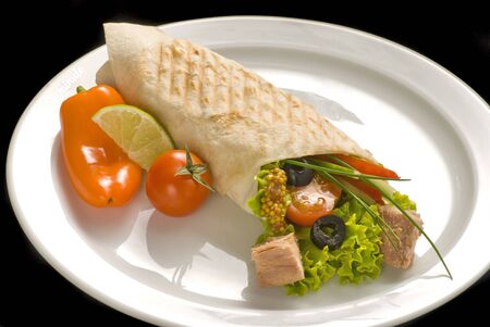 Chicken doner kebab and fresh vegetables in roll of pita bread lavash - Durum Chicken Doner Kebabの写真素材