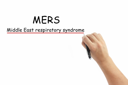 hand with pen writing MERS Middle East Respiratory Syndrome coronavirus on pure white backgroundの写真素材
