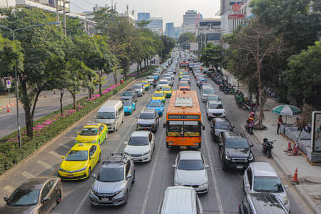 Bangkok, Thailand â December 19, 2021: Heavy traffic jam in central of capital city. Show concept of bad infrastructure, high growth of population in the city. Waste fuel and create air pollution.のeditorial素材