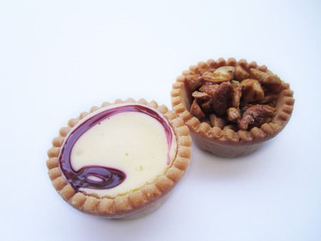 raspberry jam tart and cashew nut tartの写真素材