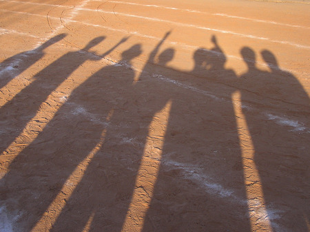 shadow of runner on racetrackの写真素材