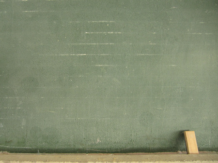 blackboard with chalk and eraserの写真素材