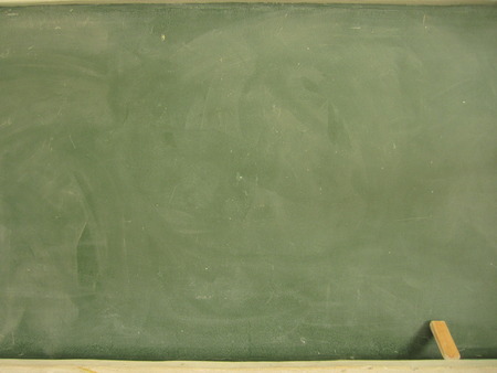 blackboard with chalk and eraserの写真素材