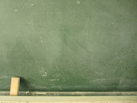 blackboard with chalk and eraserの写真素材