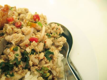 rice topped with thai spicy minced pork, thailand traditional foodの写真素材