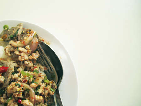 rice topped with thai spicy minced pork, thailand traditional food