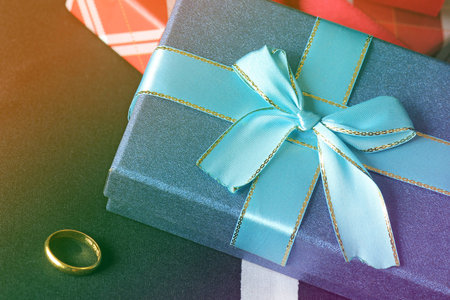 gift box with bow on bed background in vintage retro tone