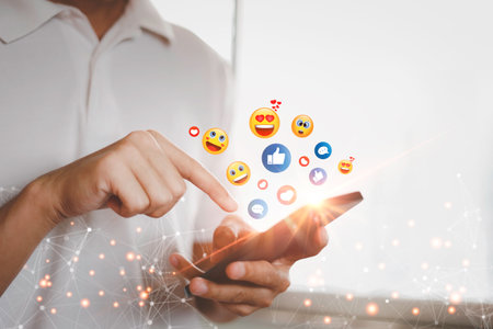 A man using smart phone with Social media, Social media and digital online concept, The concept of living on vacation and playing social media. Social Distancing, Working From Homeの写真素材