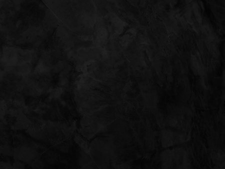 Black grunge cement wall texture background for interior or exterior design.の写真素材