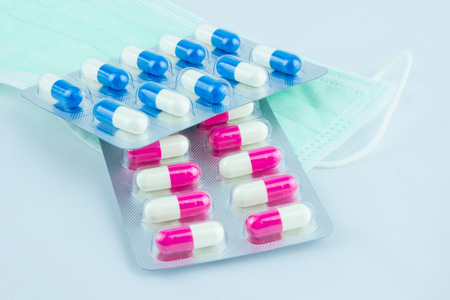 Drug panel, blue, white, pink, white, green, put on a mask. Use because patients.