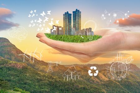 Hand hold green city, Save earth concept