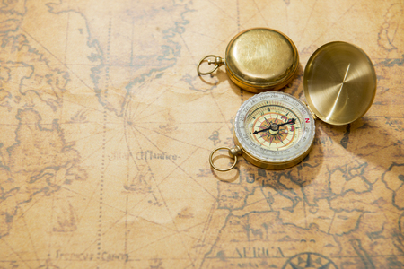old compass on vintage mapの写真素材
