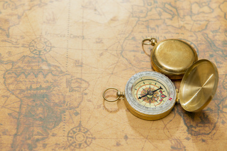 old compass on vintage mapの写真素材
