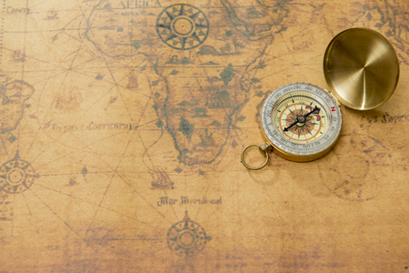 old compass on vintage mapの写真素材