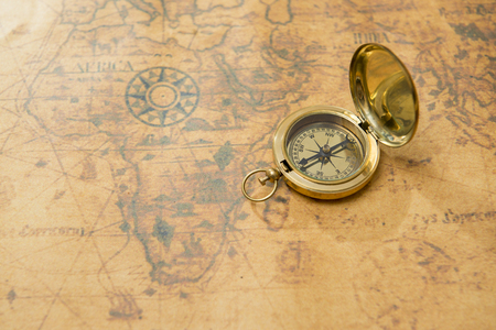 old compass on vintage mapの写真素材