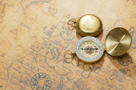 old compass on vintage mapの写真素材