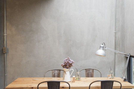 Modern desks with cement wallの写真素材