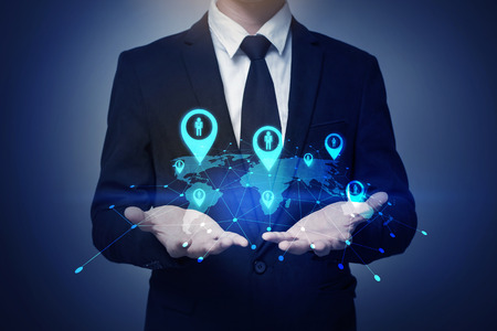  businessman holding global pin iconの写真素材