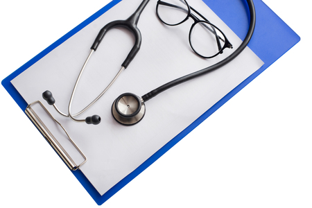 stethoscope and file on white tableの写真素材