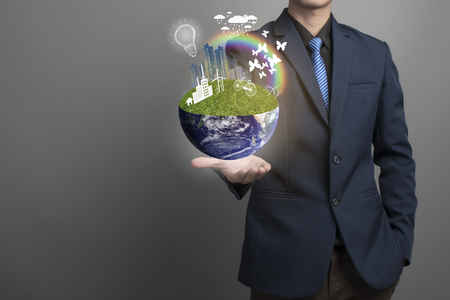 Globe ,earth in human businessman hand, save earth concept,Elements of this image furnished by NASAの写真素材