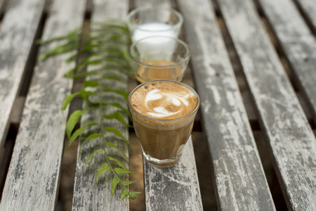 The ingredients of coffee on a wooden desk