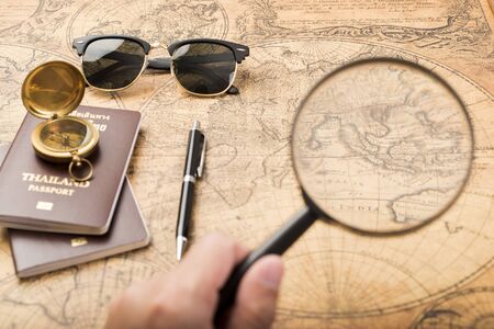 Planning travel concept, Thailand passport on old map