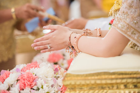 Close up of Hand bride in Thai wedding ceremonyの写真素材