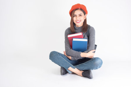 portrait of Beautiful university woman on white backgroundの写真素材