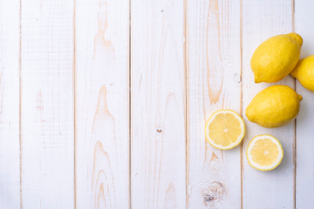 Lemon on white wooden tableの写真素材