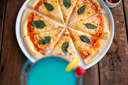 Pizza and ice summer drinkの写真素材