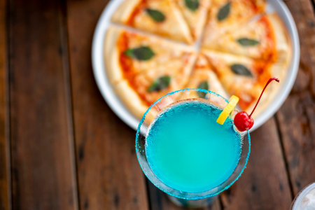 Pizza and ice summer drinkの写真素材