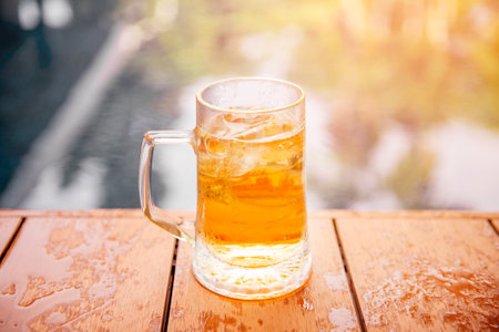 A Glass of  beer in pool party
