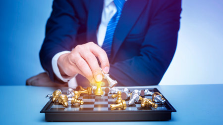 Business man is playing chess, business management strategy conceptの写真素材