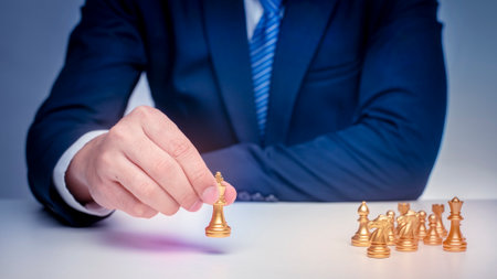 Business man is playing chess, business management strategy conceptの写真素材