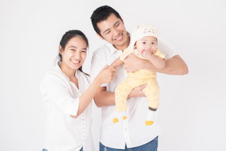 Happy Asian family are enjoy with son in studio