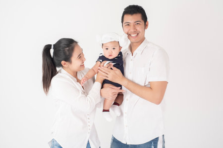 Happy Asian family are enjoy with son in studio