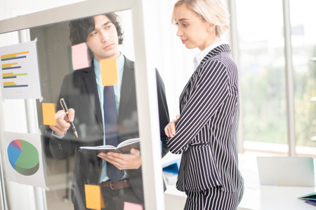 Business people are analyzing financial reportの写真素材