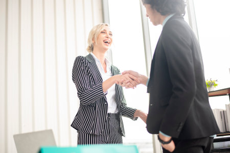 Business people are shaking handの写真素材