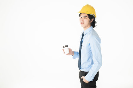 Portrait of Caucasian  handsome  engineering man is confident on white backgroundの写真素材