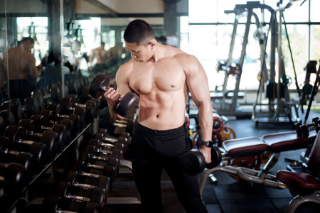A fitness man work out in the gymの写真素材