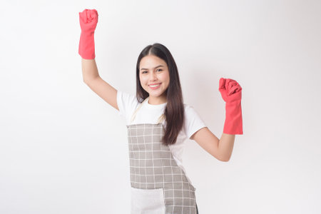 Beautiful woman housekeeper portrait on white backgroundの写真素材