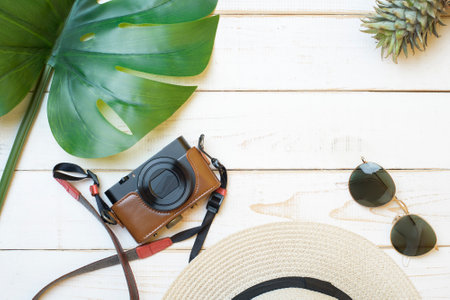 Summer accessories on white wooden  backgroundの写真素材