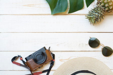 Summer accessories on white wooden  backgroundの写真素材