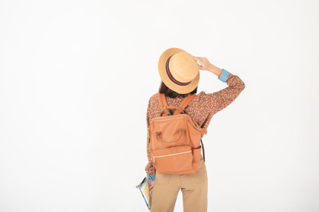 Beautiful young asian tourist woman happy on white background studio