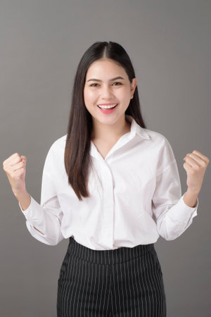 Beautiful confident successful woman portrait  in studioの写真素材