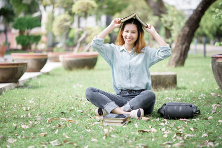 Happy young Asian University student.の写真素材