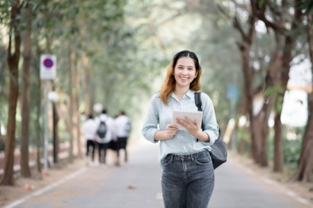Happy young Asian University student.の写真素材