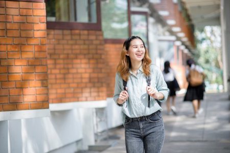 Happy young Asian University student.の写真素材