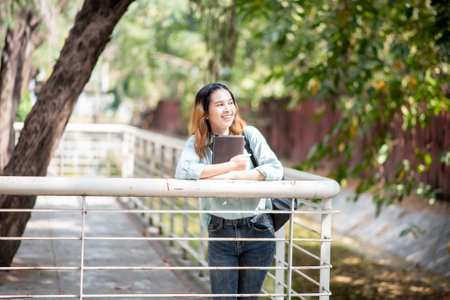 Happy young Asian University student.の写真素材
